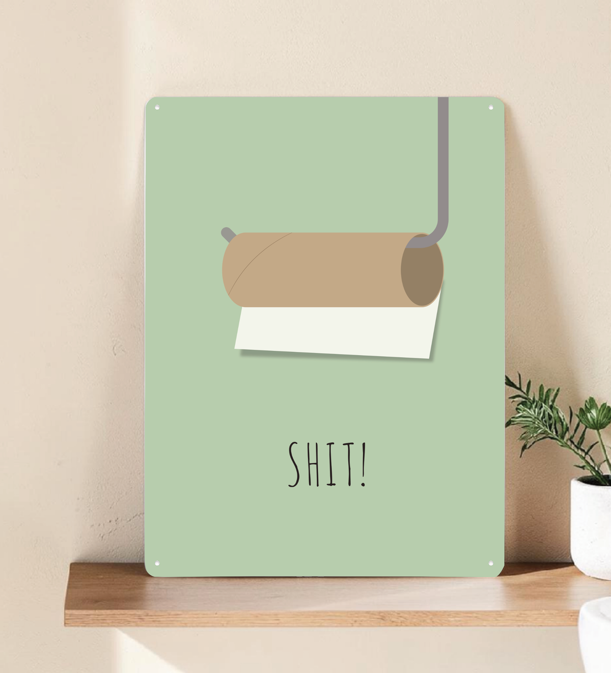 Das witzige Badezimmer-Bild aus Metall zeigt dir eine minimalistische Darstellung einer leeren Toilettenpapierrolle mit Halterung und dem Wort Shit.