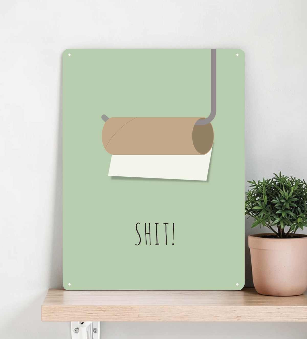 Das witzige Badezimmer-Bild aus Metall zeigt dir eine minimalistische Darstellung einer leeren Toilettenpapierrolle mit Halterung und dem Wort Shit.